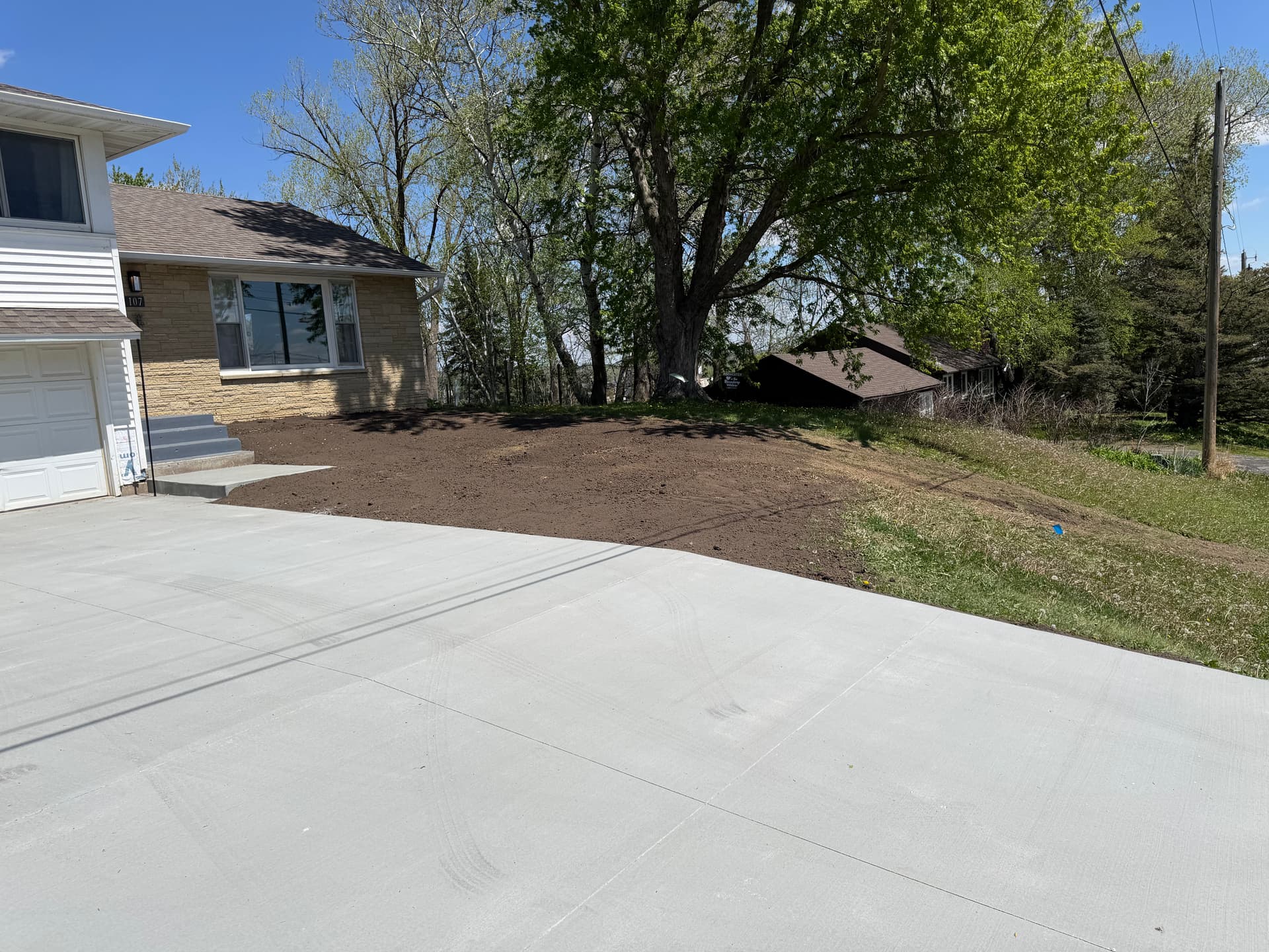 Gallery photos for Front Yard Regrading and Topsoil Cleanup After New Concrete: Image #2
