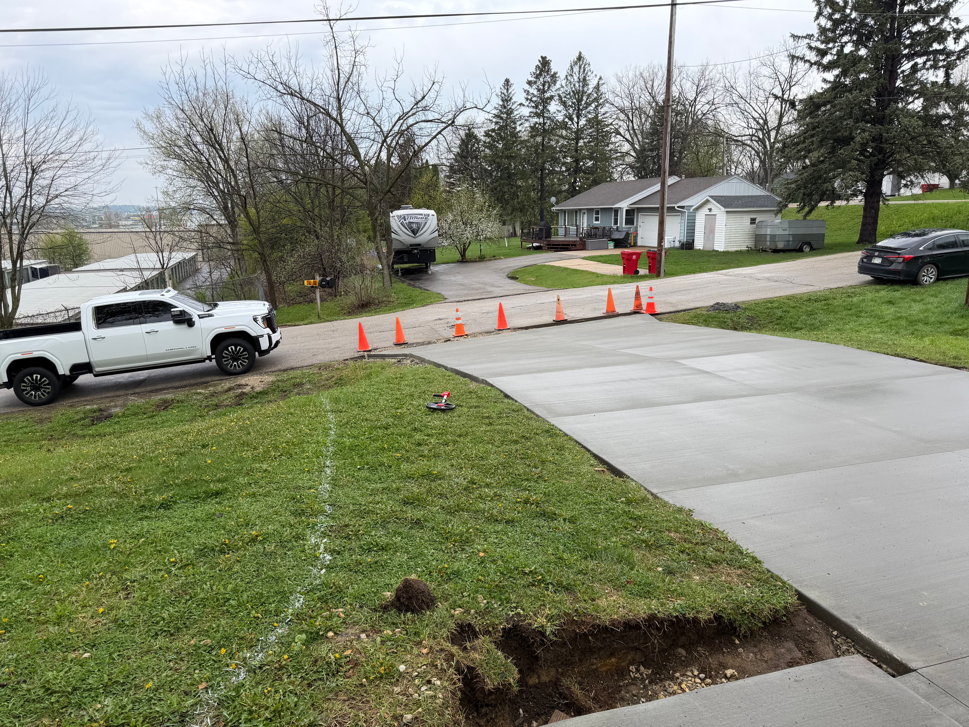 Project Front Yard Regrading and Topsoil Cleanup After New Concrete image