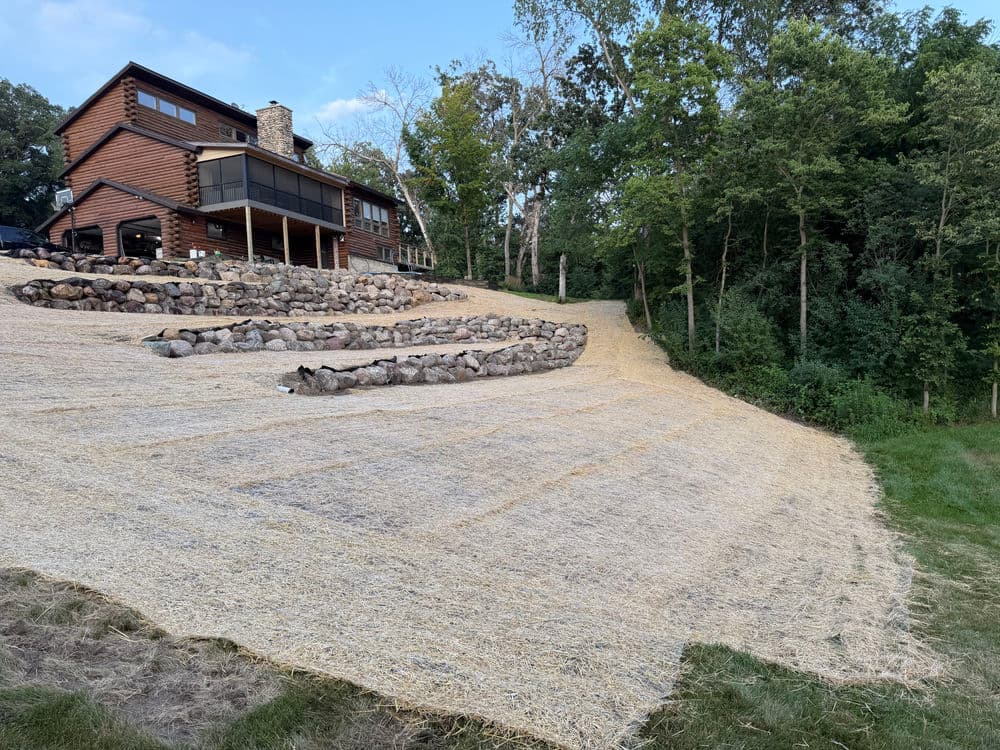 Five-Tier Boulder Retaining Wall Built Into a Zumbrota Hillside